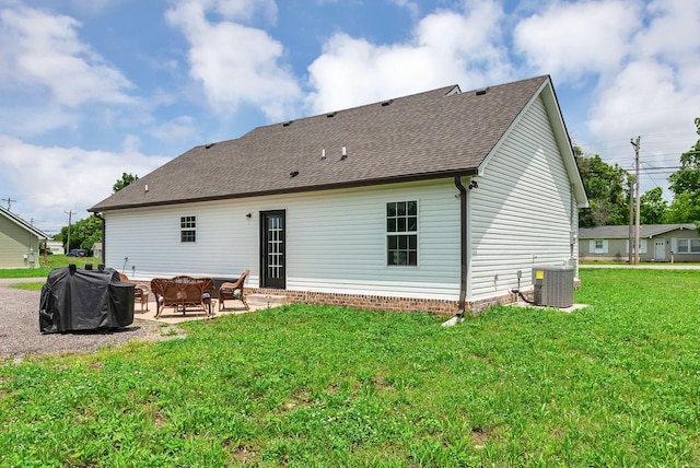 241 Holly Grove Rd, Lewisburg, TN 37091 - back of property with cooling unit, a patio area, a yard, and a shingled roof