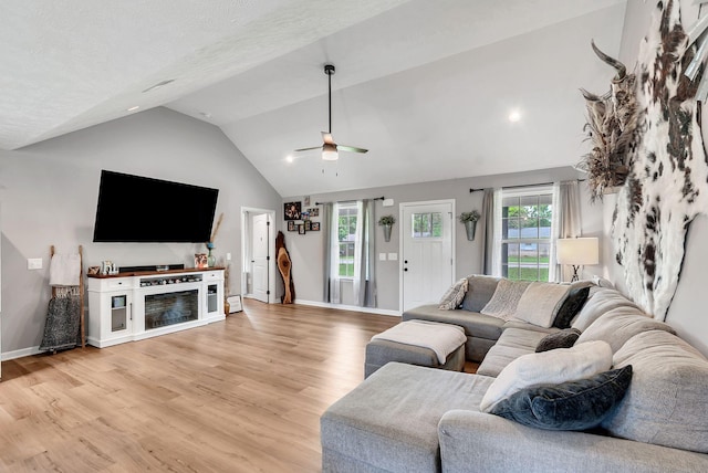 241 Holly Grove Rd, Lewisburg, TN 37091 - living room with vaulted ceiling, ceiling fan, light wood-type flooring, and baseboards
