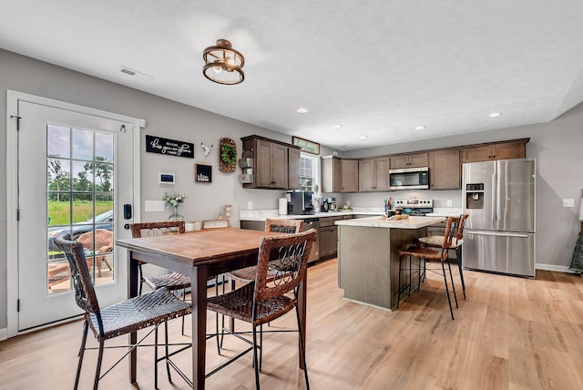 241 Holly Grove Rd, Lewisburg, TN 37091 - dining room featuring light wood-style floors, recessed lighting, and baseboards
