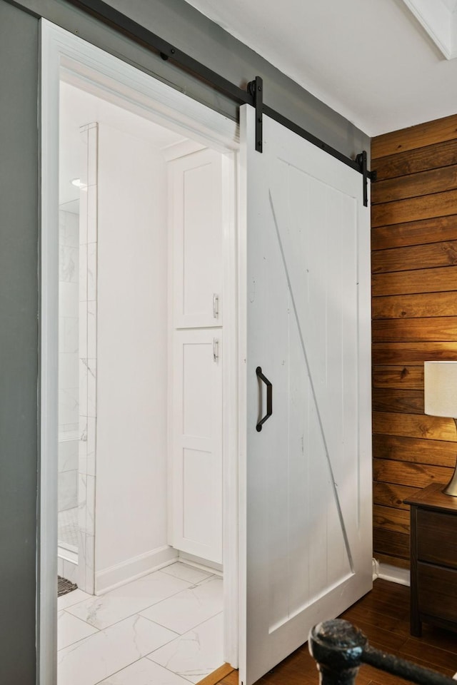 2754 Douglas Ln, Thompsons Station, TN 37179 - full bathroom with wooden walls, marble finish flooring, and a shower