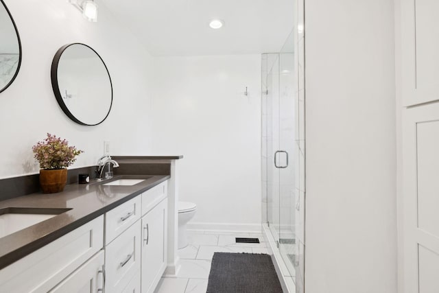 2754 Douglas Ln, Thompsons Station, TN 37179 - bathroom with double vanity, a shower stall, toilet, marble look tile flooring, and recessed lighting