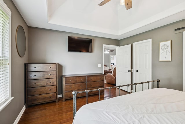 2754 Douglas Ln, Thompsons Station, TN 37179 - bedroom with dark wood-style floors, baseboards, and a ceiling fan