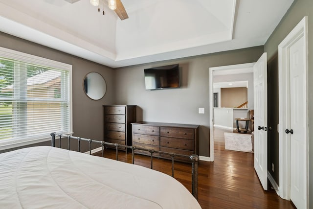 2754 Douglas Ln, Thompsons Station, TN 37179 - bedroom with baseboards, dark wood-style floors, a raised ceiling, and a ceiling fan