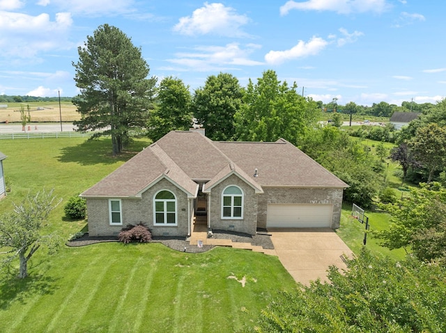 2754 Douglas Ln, Thompsons Station, TN 37179 - view of front of house featuring brick siding, concrete driveway, a garage, and roof with shingles