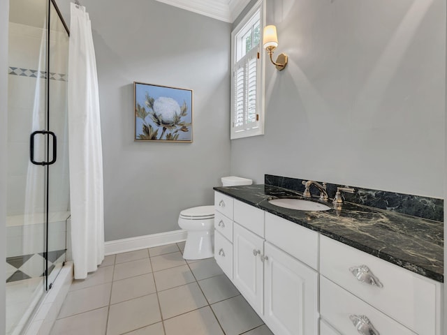 113 Middleton Cir, Nashville, TN 37215 - full bathroom featuring a shower stall, toilet, vanity, tile patterned floors, and crown molding