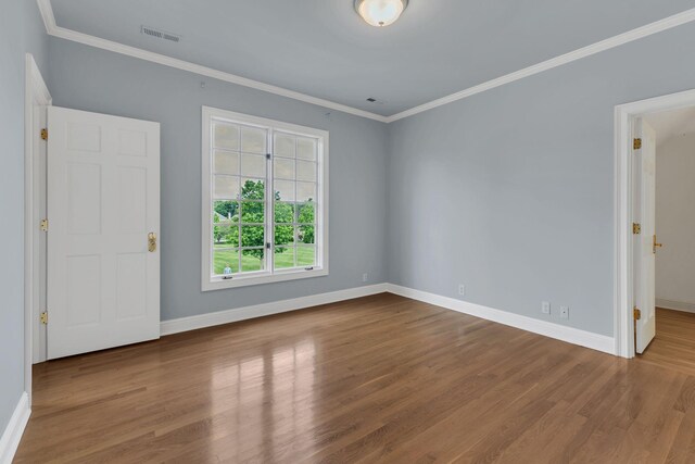 113 Middleton Cir, Nashville, TN 37215 - empty room with baseboards, ornamental molding, and wood finished floors
