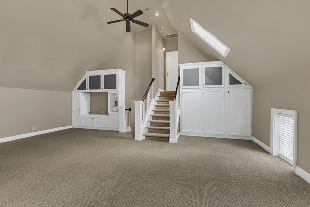 113 Middleton Cir, Nashville, TN 37215 - additional living space featuring vaulted ceiling, carpet floors, ceiling fan, a skylight, and baseboards