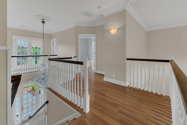 113 Middleton Cir, Nashville, TN 37215 - corridor with an upstairs landing, wood finished floors, crown molding, and baseboards
