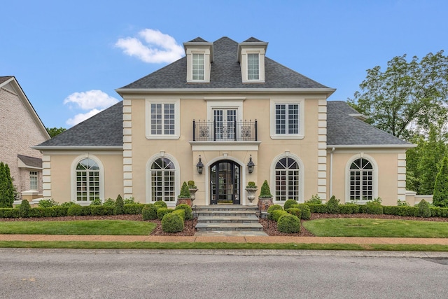 113 Middleton Cir, Nashville, TN 37215 - georgian-style home with a balcony, a shingled roof, french doors, and stucco siding