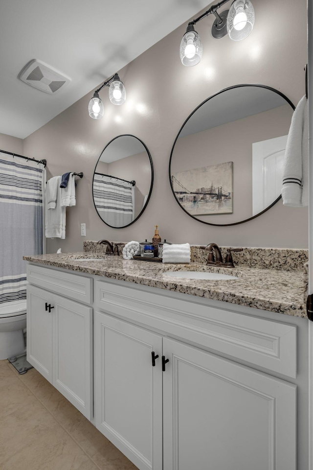5190 Giardino Dr, Mount Juliet, TN 37122 - bathroom featuring double vanity, toilet, and a shower with shower curtain