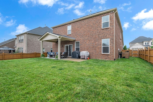 5190 Giardino Dr, Mount Juliet, TN 37122 - rear view of house featuring brick siding and a patio area