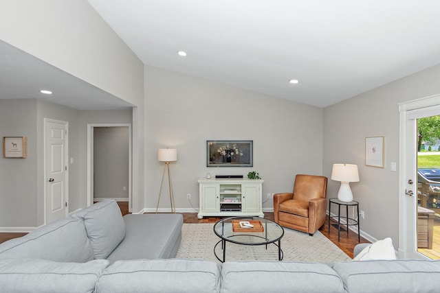 600 Riverview Dr, Franklin, TN 37064 - living room featuring baseboards, lofted ceiling, wood finished floors, and recessed lighting