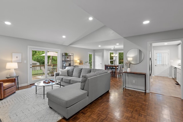 600 Riverview Dr, Franklin, TN 37064 - living area with healthy amount of natural light, vaulted ceiling, recessed lighting, and baseboards
