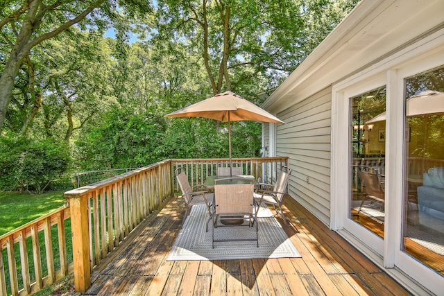 600 Riverview Dr, Franklin, TN 37064 - wooden deck featuring outdoor dining space and view of scattered trees