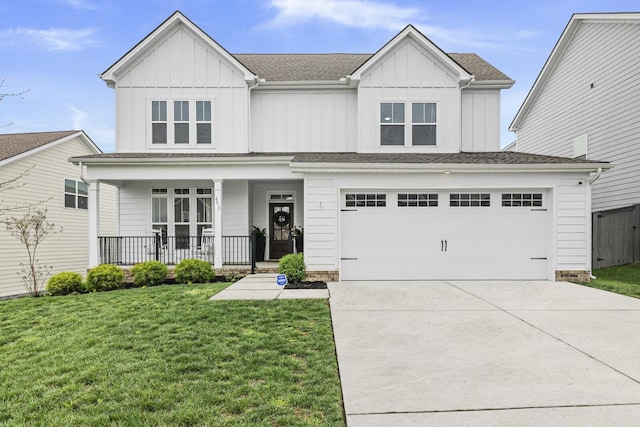 6013 Doster Rd, Smyrna, TN 37167 - view of front of house with board and batten siding, driveway, covered porch, and a front yard