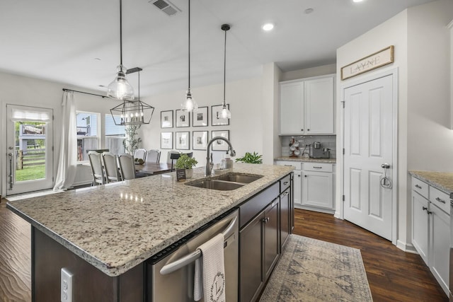 6013 Doster Rd, Smyrna, TN 37167 - kitchen featuring a sink, dishwasher, a kitchen island with sink, white cabinets, and recessed lighting