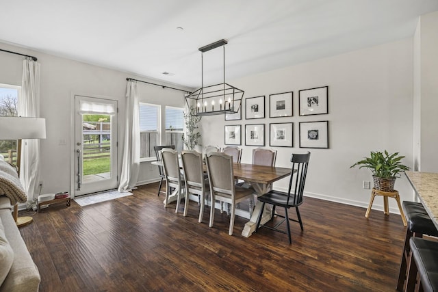 6013 Doster Rd, Smyrna, TN 37167 - dining space with a chandelier and dark wood-style floors