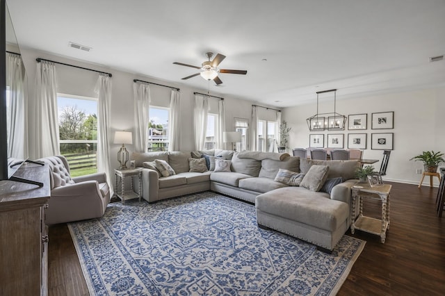 6013 Doster Rd, Smyrna, TN 37167 - living room with a ceiling fan, dark wood-style flooring, and a chandelier