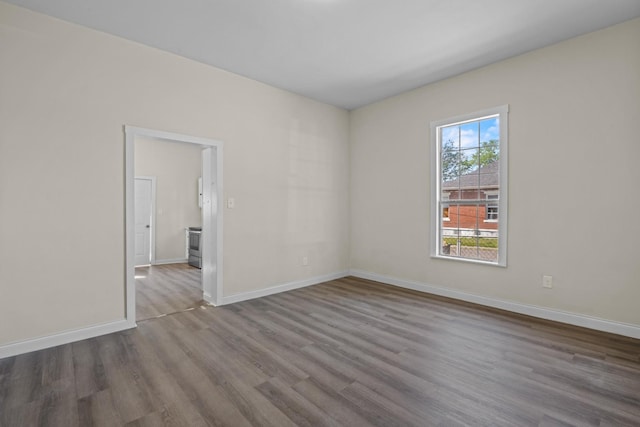 1601 S Willow St, Chattanooga, TN 37404 - empty room with wood finished floors and baseboards