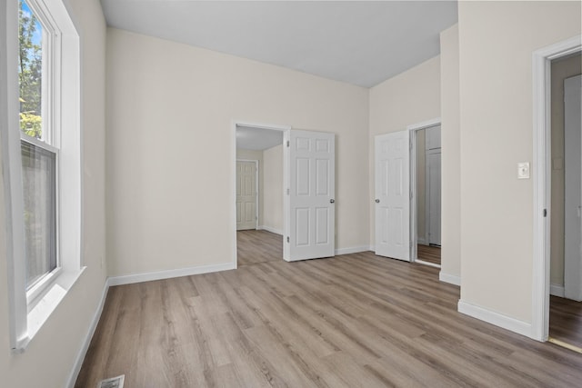 1601 S Willow St, Chattanooga, TN 37404 - unfurnished bedroom with light wood-style floors and baseboards