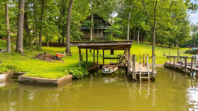 7321 Coastal Dr, Harrison, TN 37341 - dock with view of wooded area and a lawn