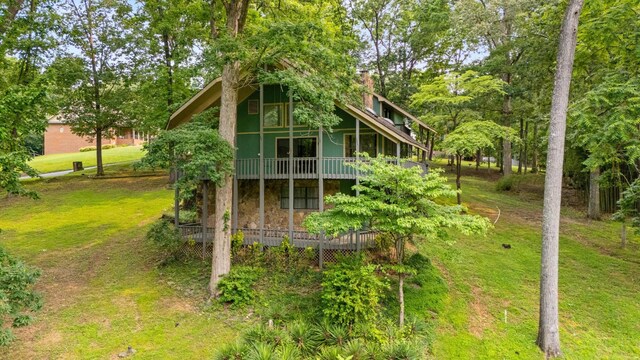 7321 Coastal Dr, Harrison, TN 37341 - back of house with a lawn and a chimney