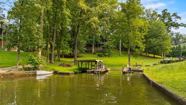 7321 Coastal Dr, Harrison, TN 37341 - dock area with a water view, a lawn, and view of wooded area