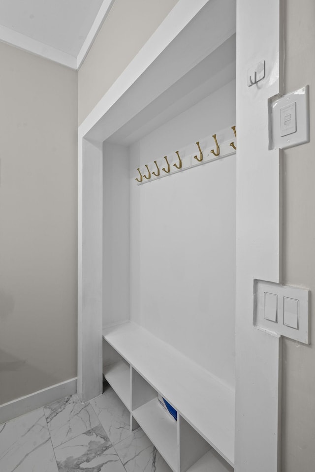 116 31st Ave N Unit 104, Nashville, TN 37203 - mudroom featuring marble finish flooring and baseboards