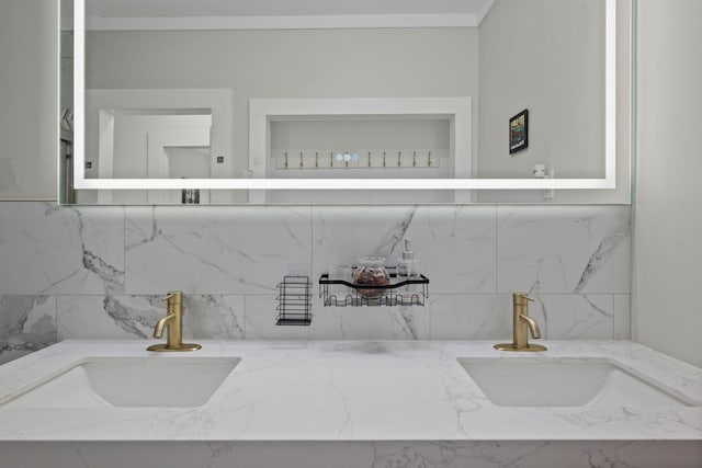 116 31st Ave N Unit 104, Nashville, TN 37203 - bathroom view of double vanity and tasteful backsplash