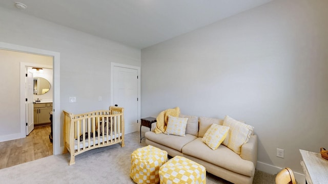 1137 Fiona Dr, Lebanon, TN 37087 - bedroom with baseboards, light colored carpet, and a sink