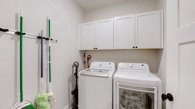 1137 Fiona Dr, Lebanon, TN 37087 - laundry area featuring washing machine and clothes dryer and cabinet space