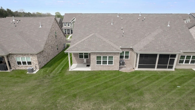 1137 Fiona Dr, Lebanon, TN 37087 - rear view of property with a patio area, a lawn, central air condition unit, and roof with shingles