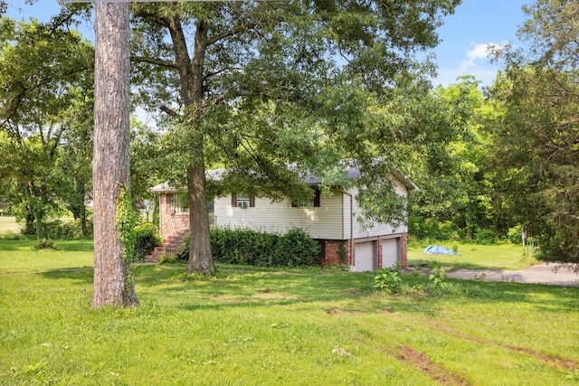169 Wawona Dr, Wildwood, GA 30757 - view of green lawn featuring a garage
