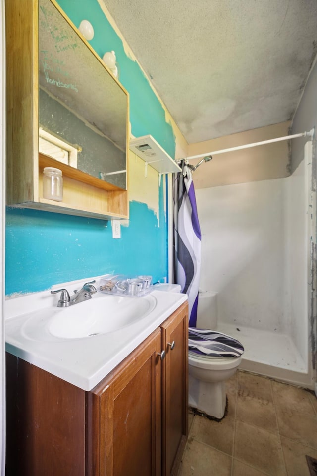 169 Wawona Dr, Wildwood, GA 30757 - bathroom featuring a stall shower, vanity, toilet, and a textured ceiling