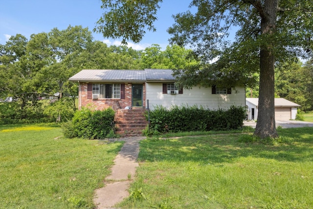 169 Wawona Dr, Wildwood, GA 30757 - single story home featuring a front yard, a garage, and brick siding
