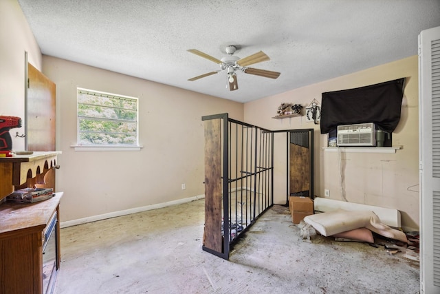 169 Wawona Dr, Wildwood, GA 30757 - bedroom featuring cooling unit, a textured ceiling, baseboards, ceiling fan, and concrete flooring