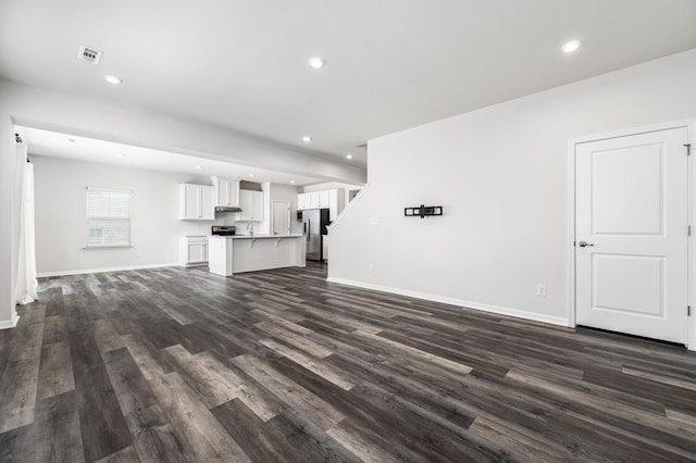 913 Fancher Ln, Joelton, TN 37080 - unfurnished living room featuring dark wood finished floors, recessed lighting, and baseboards