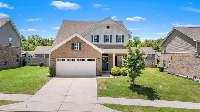913 Fancher Ln, Joelton, TN 37080 - view of front of property featuring board and batten siding, driveway, brick siding, and central air condition unit