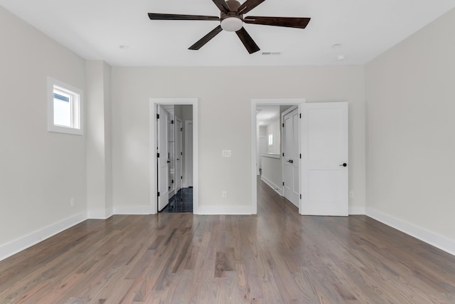1816B Ashton Ave, Nashville, TN 37218 - unfurnished bedroom featuring baseboards, wood finished floors, and ceiling fan