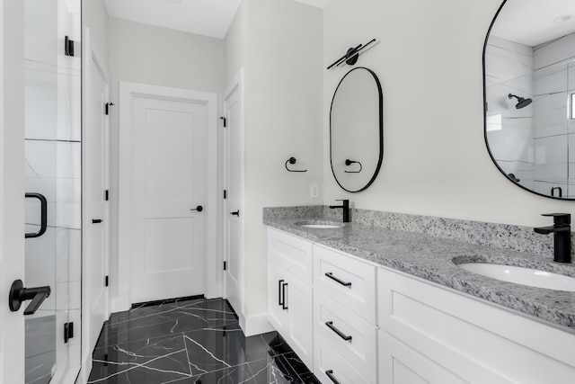 1816B Ashton Ave, Nashville, TN 37218 - full bath with double vanity, a stall shower, marble finish flooring, and baseboards