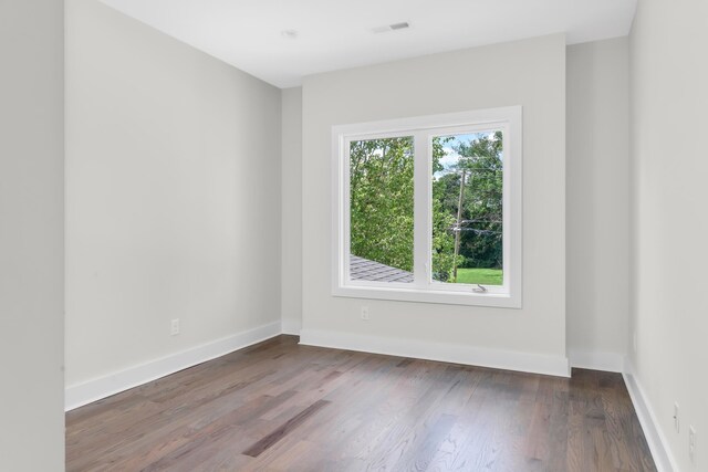 1816B Ashton Ave, Nashville, TN 37218 - unfurnished room featuring wood finished floors and baseboards