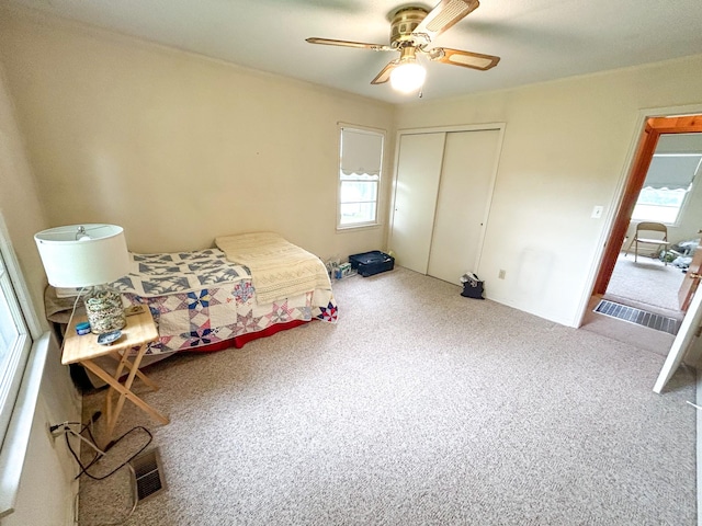 72 Allen Ln, Huntingdon, TN 38344 - bedroom featuring a closet, carpet, and a ceiling fan