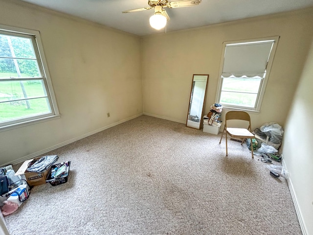 72 Allen Ln, Huntingdon, TN 38344 - carpeted empty room with a ceiling fan, baseboards, and ornamental molding
