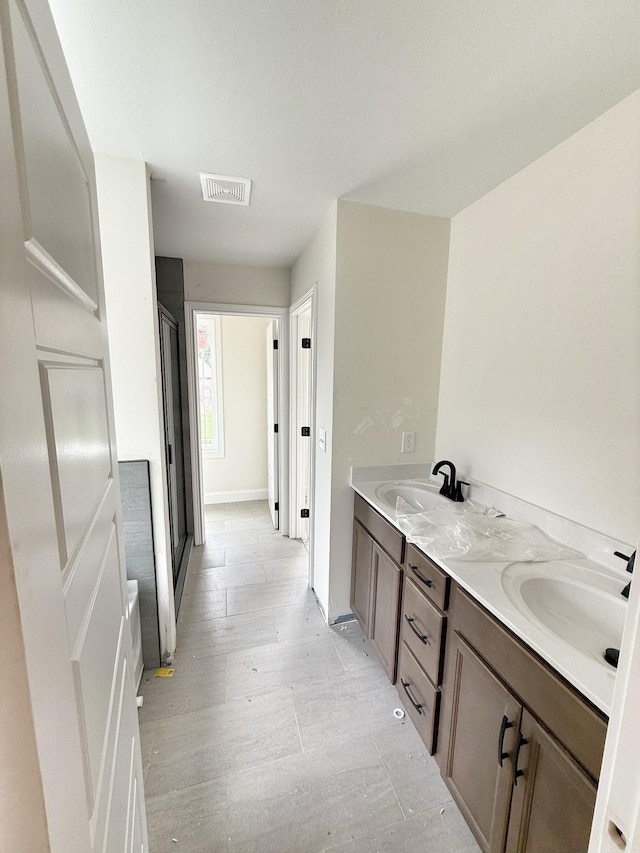 209 Griffey Ests, Clarksville, TN 37042 - bathroom featuring double vanity and a shower stall