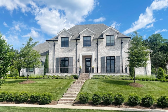 1518 Amesbury Ln, Franklin, TN 37069 - french country style house with a front yard and stairs