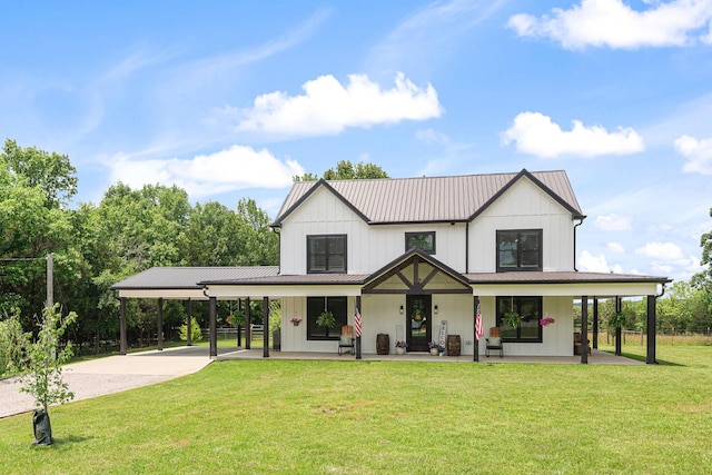 2824 Robert Truelove Rd, Columbia, TN 38401 - modern farmhouse style home featuring covered porch, driveway, board and batten siding, and metal roof
