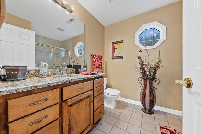 266 Campground Rd, Olmstead, KY 42265 - full bathroom featuring toilet, tile patterned flooring, vanity, a shower stall, and baseboards