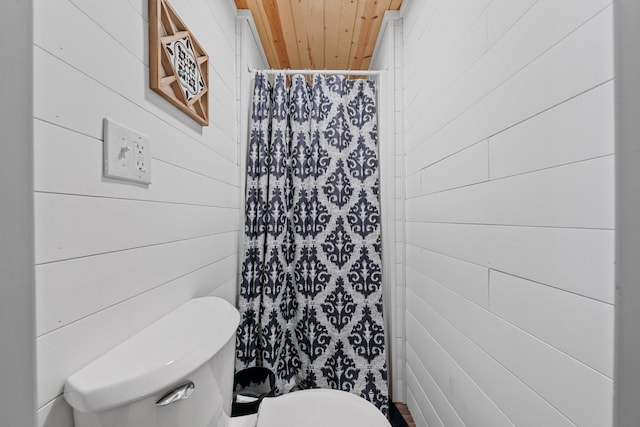 266 Campground Rd, Olmstead, KY 42265 - full bathroom with toilet, a shower with shower curtain, wooden ceiling, and wooden walls
