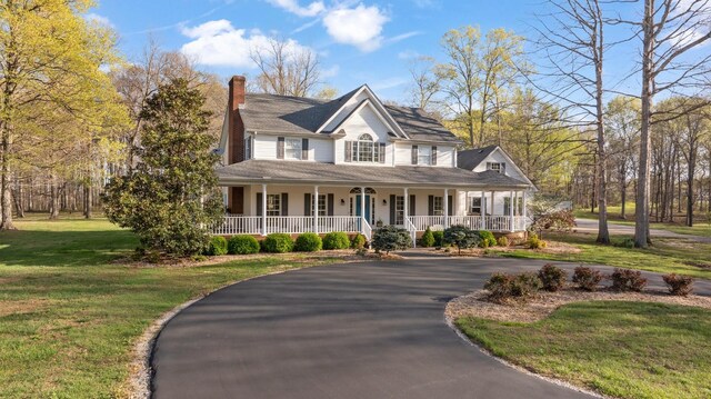 266 Campground Rd, Olmstead, KY 42265 - view of front of property featuring a porch, asphalt driveway, a chimney, and a front yard