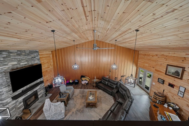 266 Campground Rd, Olmstead, KY 42265 - living room with lofted ceiling, a fireplace, wooden walls, wood finished floors, and wood ceiling